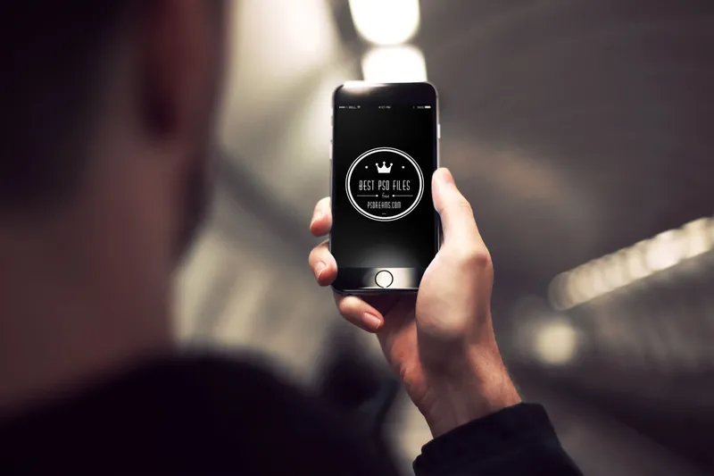 iPhone 6 in Hand PSD Mockup