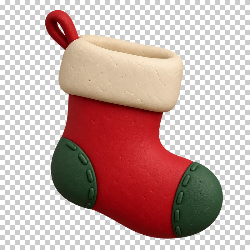 A red clay Christmas stocking with a cream cuff, green heel and toe patches and a red hanging loop.