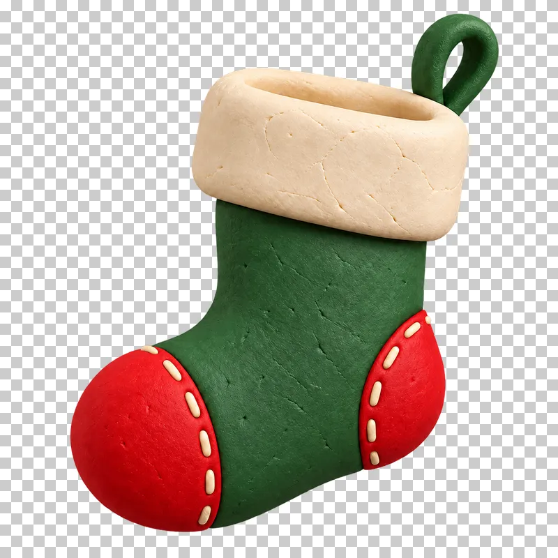 A dark green clay Christmas stocking with a cream cuff, red heel and toe and a green hanging loop.