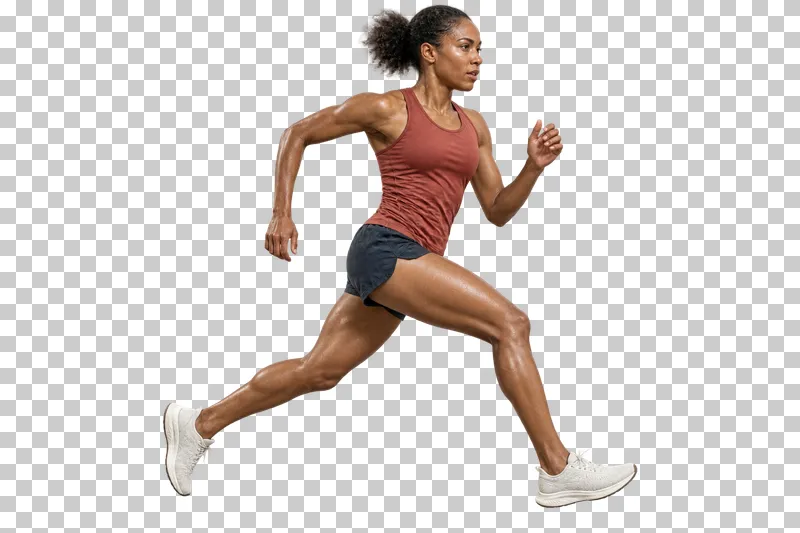 A woman in a brick-red top and navy shorts running in a long sprint stride.