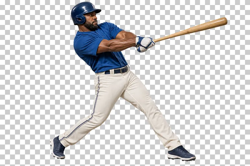 A man in a muted-blue baseball jersey and cream trousers swinging a wooden bat.
