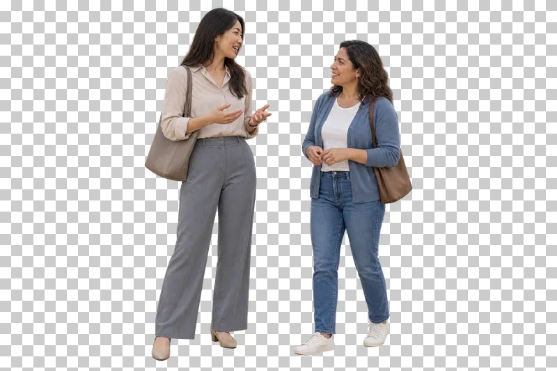 Two women in muted casual clothing walking together in conversation.