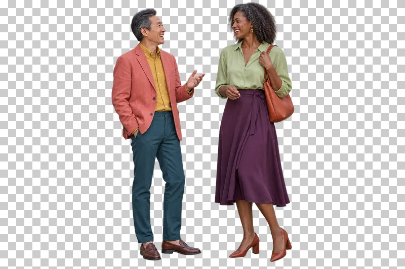 A laughing couple in a coral jacket and pistachio blouse, with petrol trousers and a plum skirt.