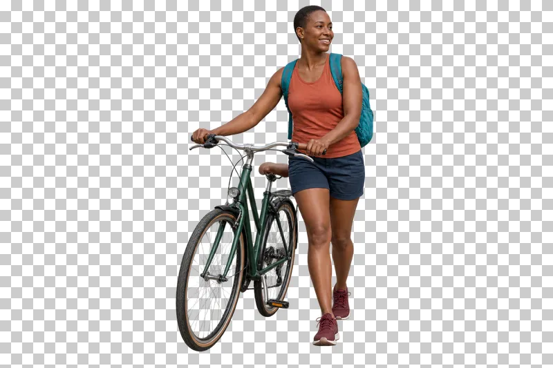 A woman in a rust sleeveless top and navy shorts guiding a green city bicycle with a turquoise backpack.