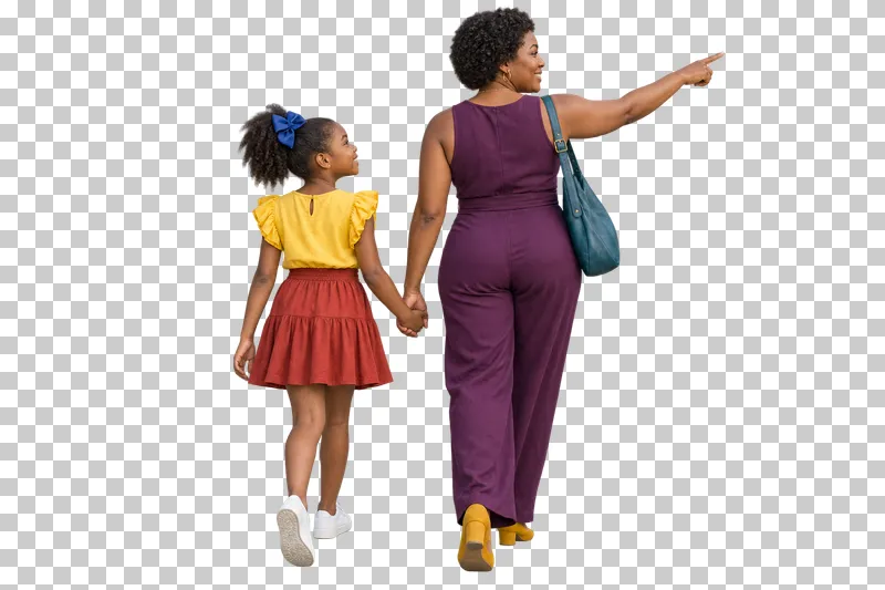 A mother in a plum jumpsuit walking hand in hand with her daughter in a yellow blouse and red skirt while pointing ahead.