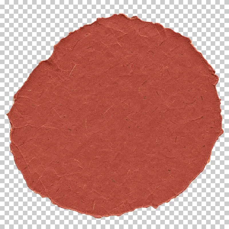 Irregular oval of brick-red paper, viewed directly from above.