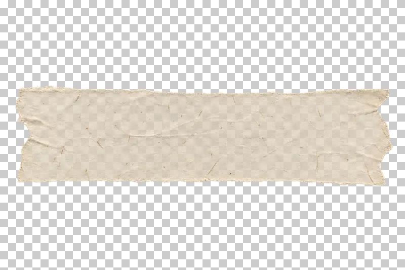 Wide cream paper tape strip with torn ends, viewed directly from above.