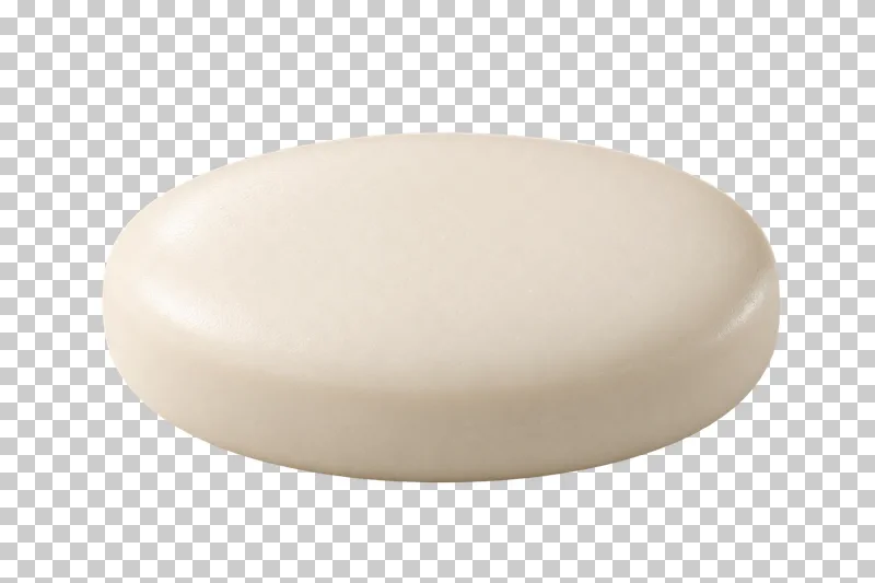 A plain oval ivory soap bar with rounded edges and a lightly textured surface.