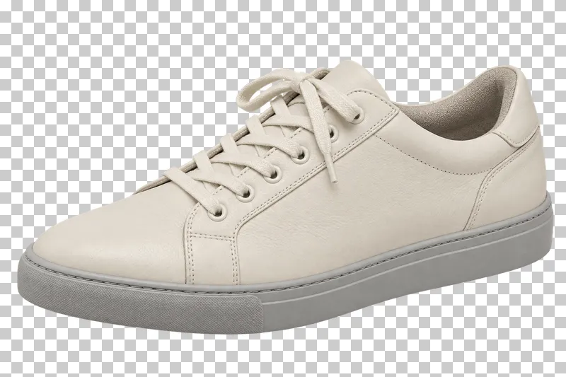 An ivory leather right sneaker with cream laces and a light gray rubber sole, pointing left.