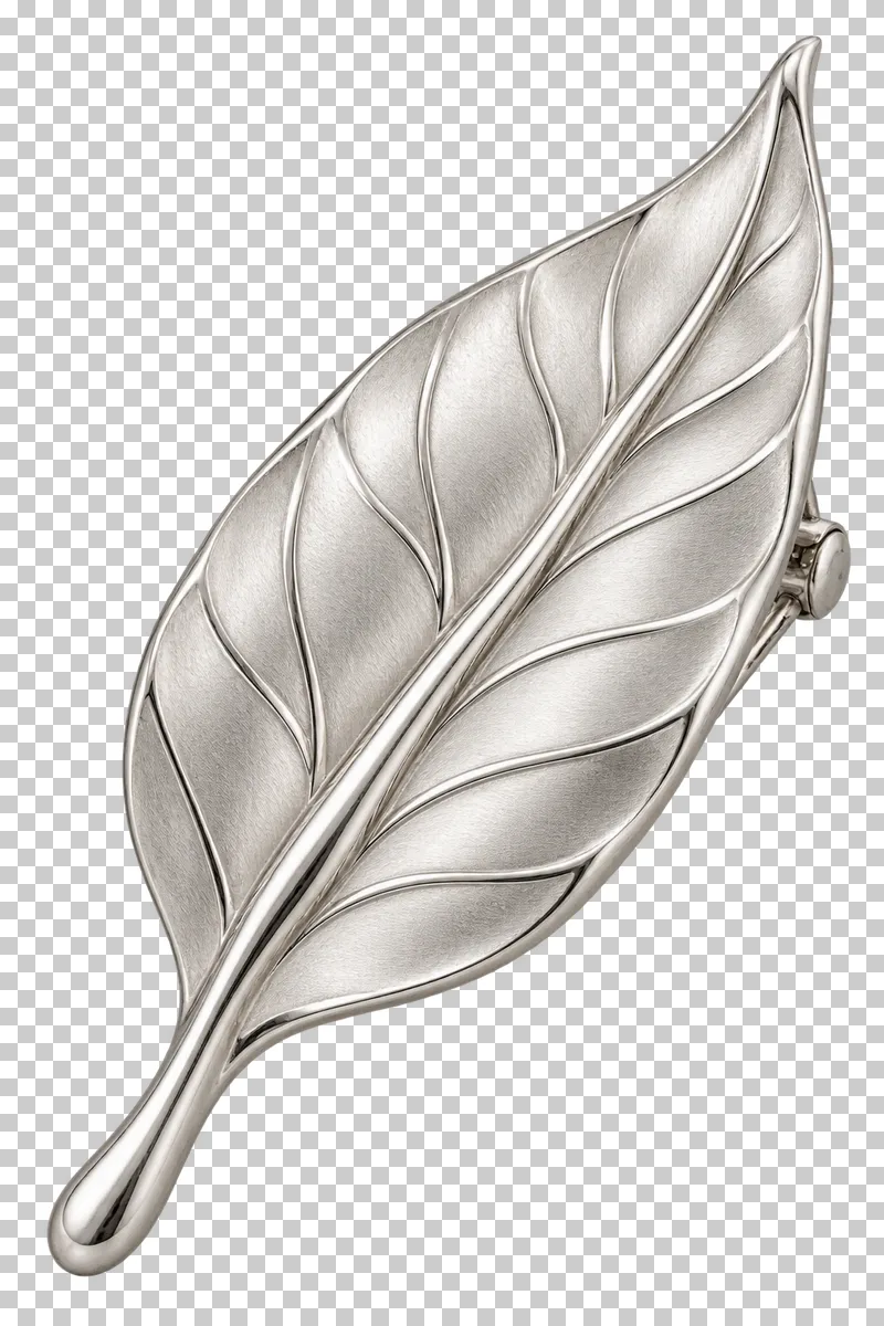 A silver leaf brooch with raised veins and a short stem.