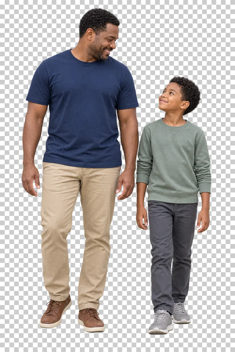 A father in a navy T-shirt standing beside his son in a sage sweatshirt.