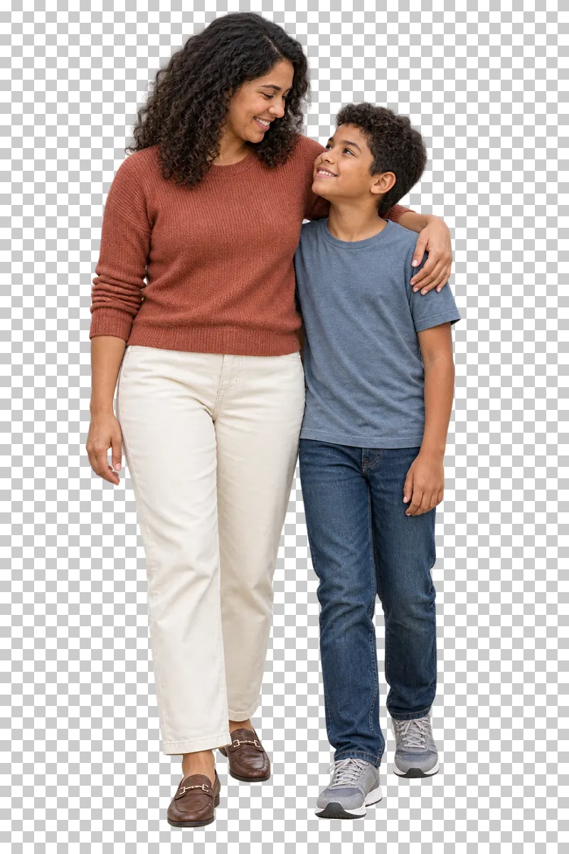 A mother in a rust sweater embracing her son standing beside her.