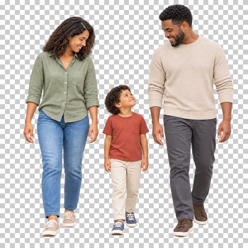 Two parents with their young child between them, walking together with relaxed separate hands.
