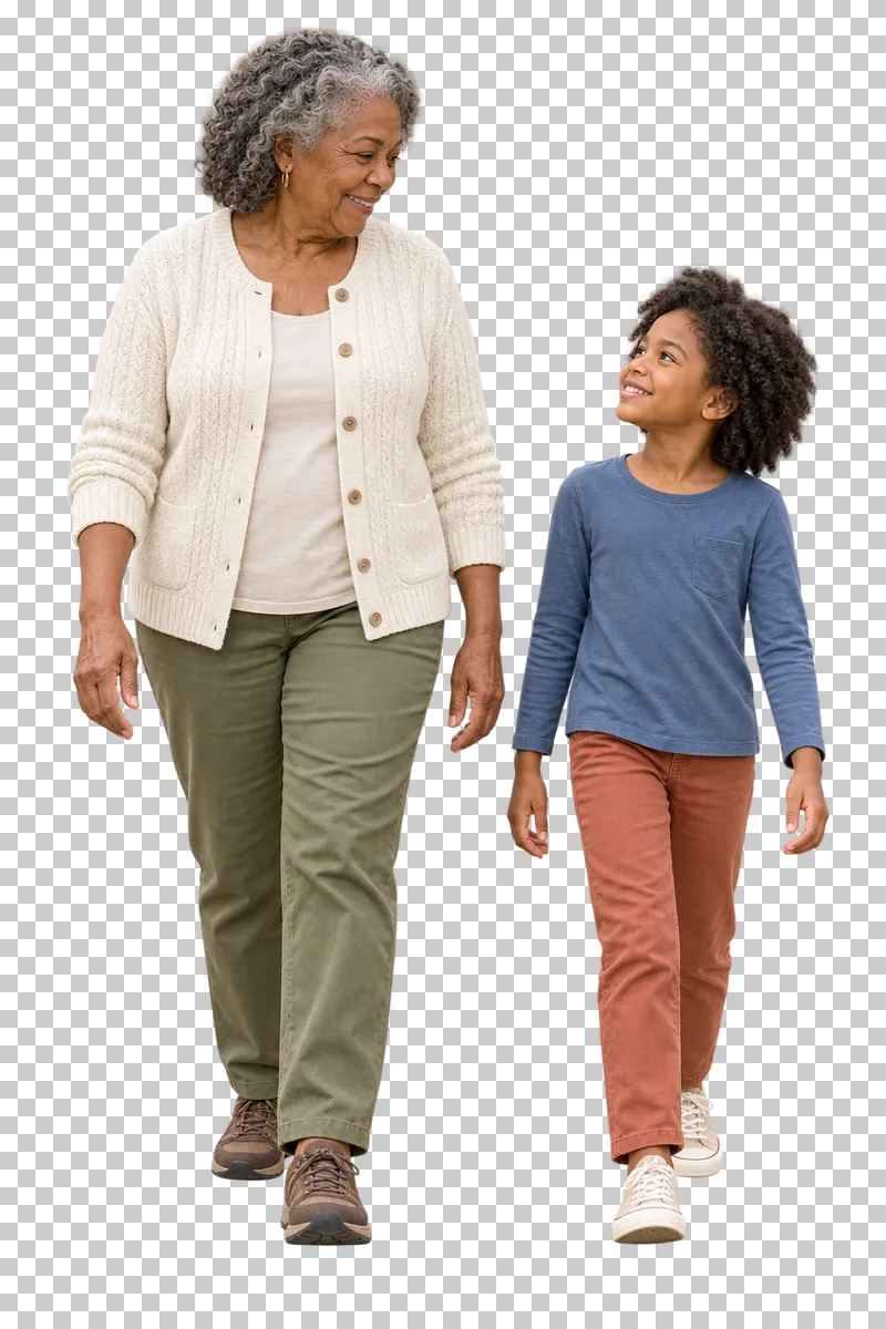 A grandmother in a cream cardigan walking beside her granddaughter.
