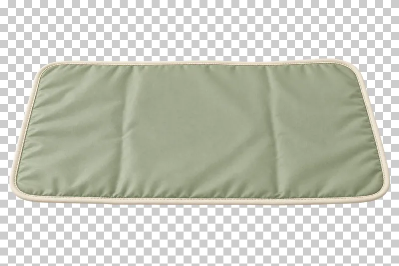 Sage padded changing mat with cream edge binding and gentle fold creases.