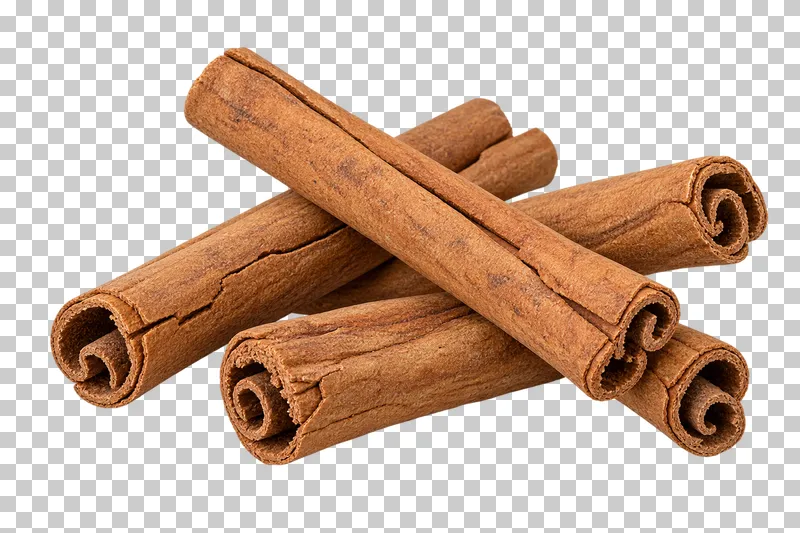 A loosely crossed group of cinnamon sticks with rolled woody layers and curled hollow ends.