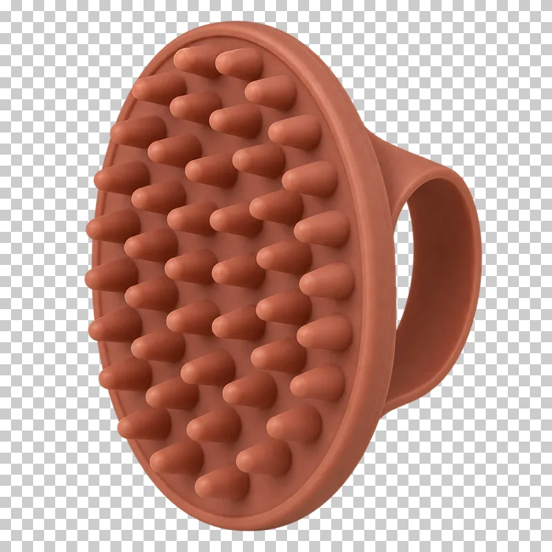 Silicone massage brush in terracotta silicone, photographed as a complete isolated product on a transparent background.