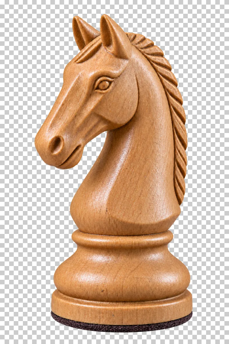 A carved natural wooden Staunton chess knight with a horse head.