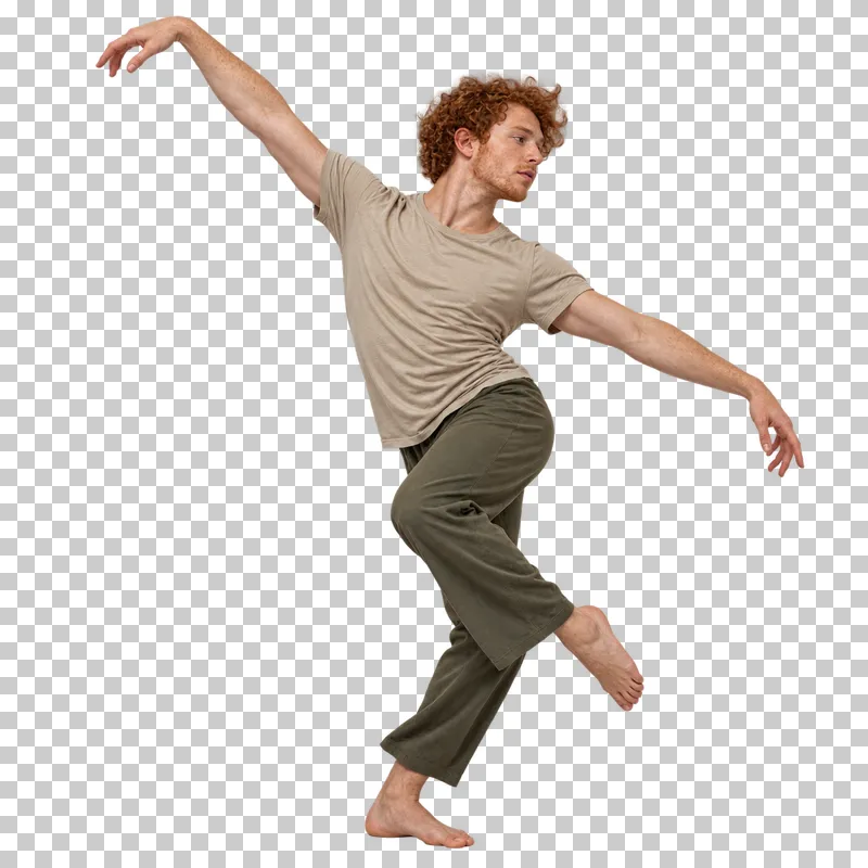 Male contemporary dancer in a sand T-shirt and olive trousers making a grounded spiral turn.