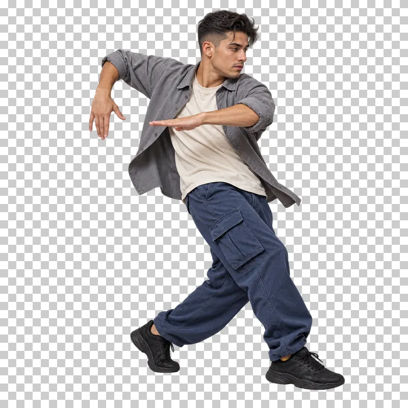 Male hip-hop dancer in a gray overshirt and blue cargo trousers performing a pivot turn.