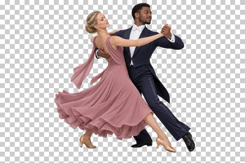 Full-length waltz couple in a rose ballroom dress and navy suit making a traveling turn.