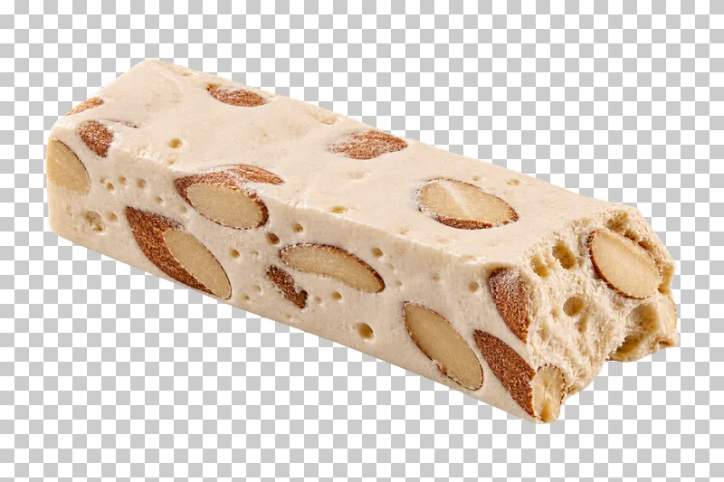 An ivory nougat bar with embedded almonds and a rough broken end.