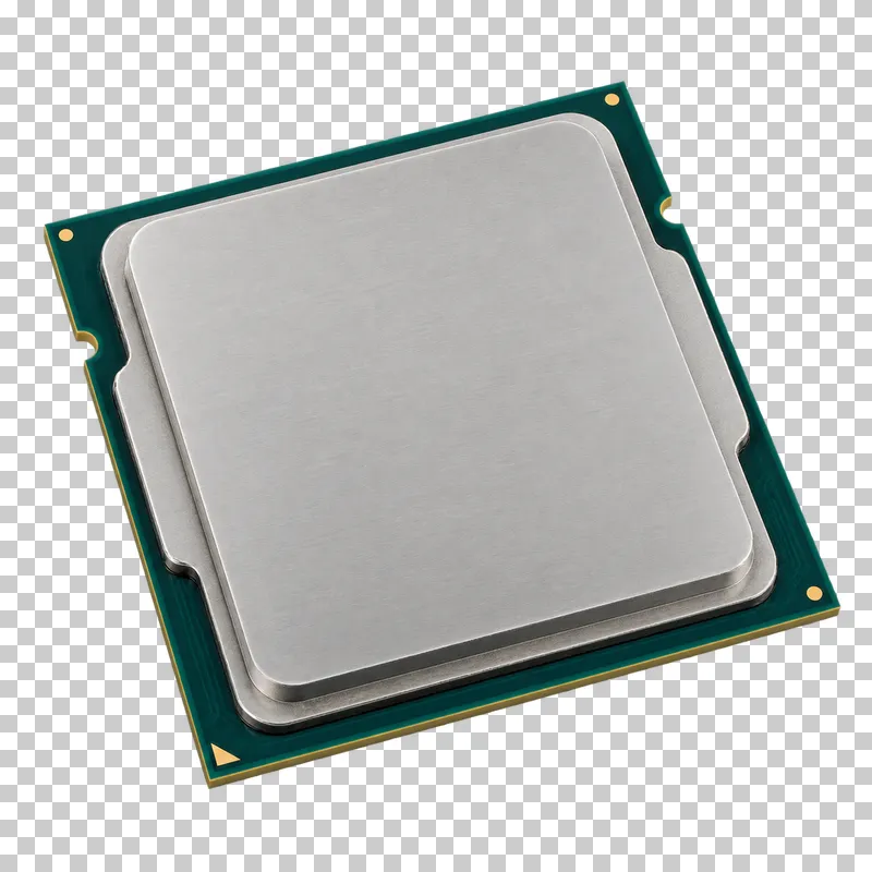 A processor with a brushed silver heat spreader on a green substrate.