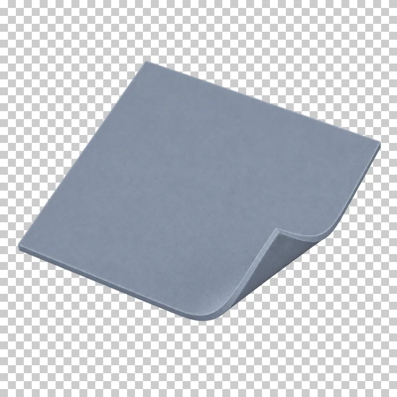A gray thermal pad sheet with a softly curled corner.