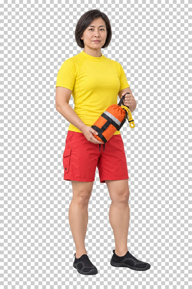 Female water rescuer in a yellow top and red swim shorts holding a rope throw bag, isolated on a transparent background
