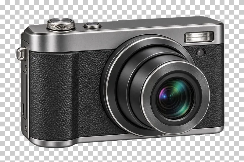 A small compact camera with a circular lens and switched-off rear screen.