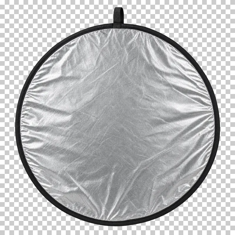 An unfolded circular photography reflector with a silver fabric face and black rim.