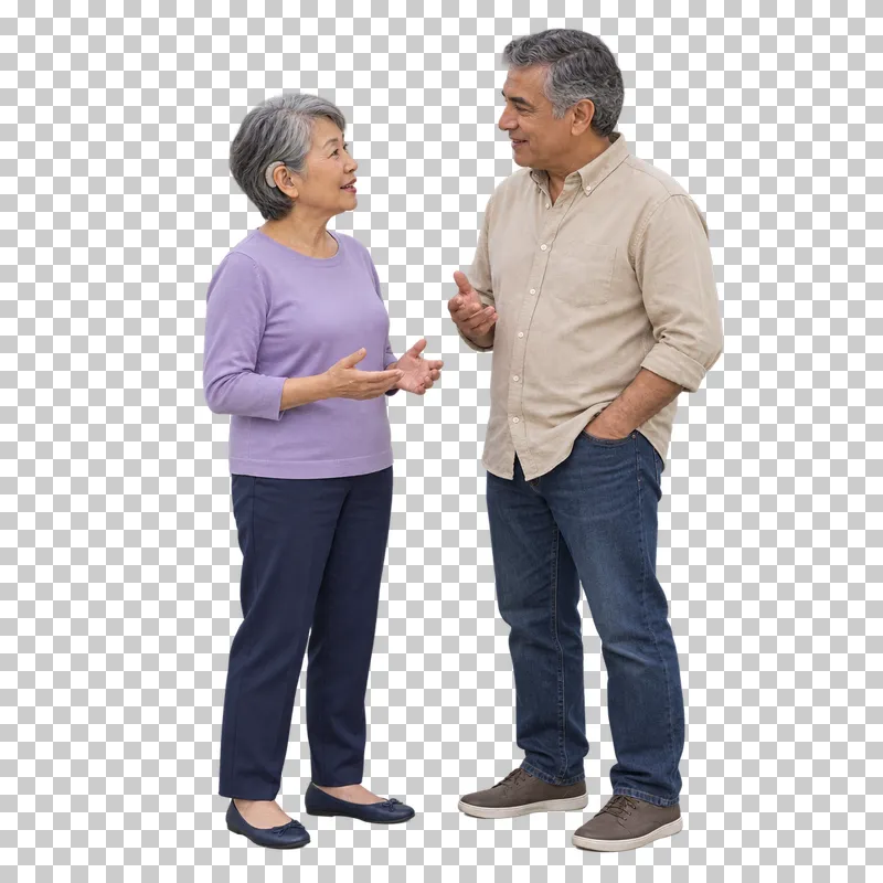 An adult couple talking face to face, with one woman wearing a visible hearing aid.