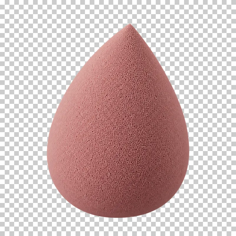A muted rose makeup sponge with a porous surface.