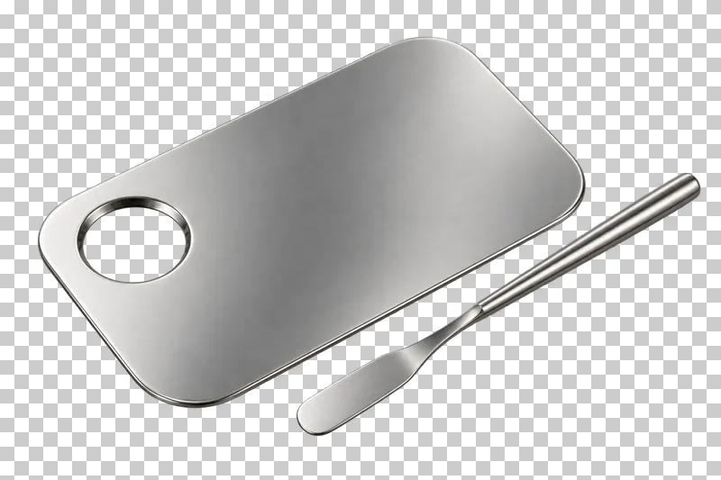 A metal mixing palette with a transparent thumb hole and separate spatula.
