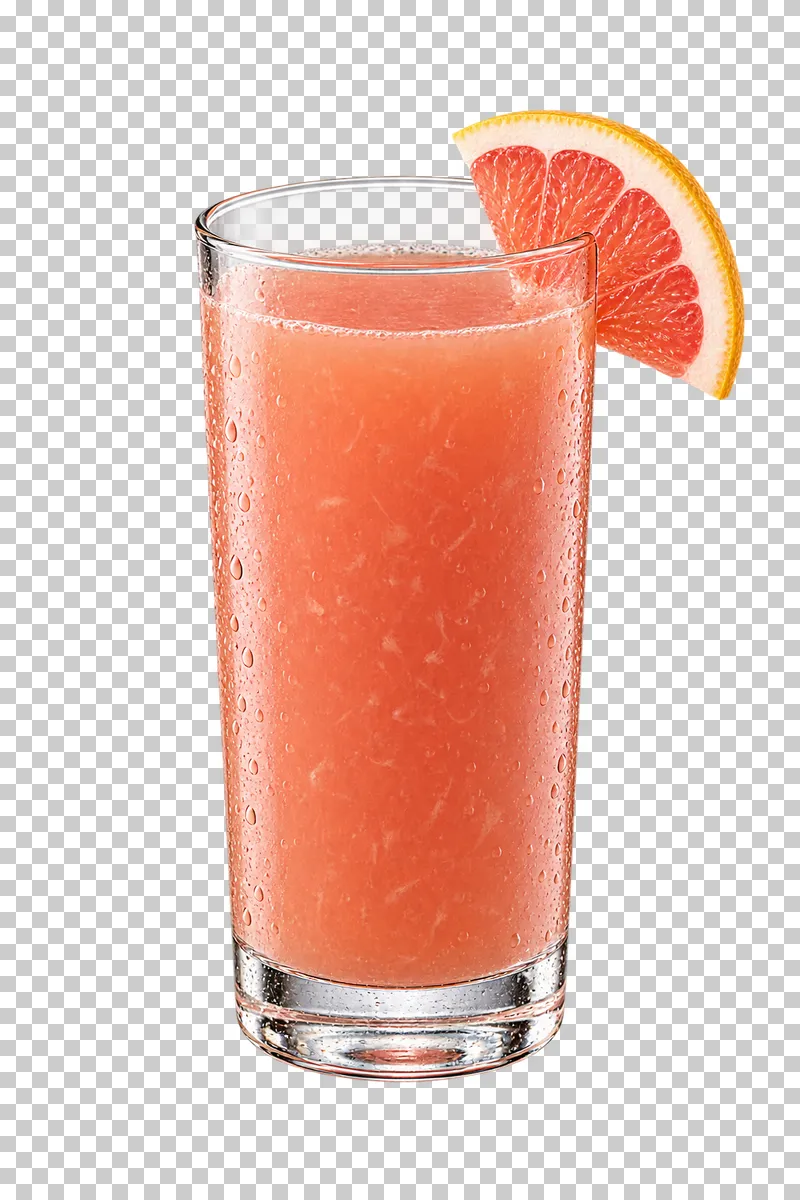 Cloudy pink grapefruit juice in a tall glass, with a grapefruit slice on the rim.