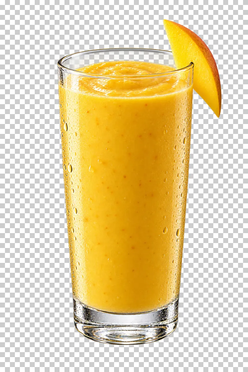 Thick golden mango smoothie in a tall glass, with a mango slice on the rim.