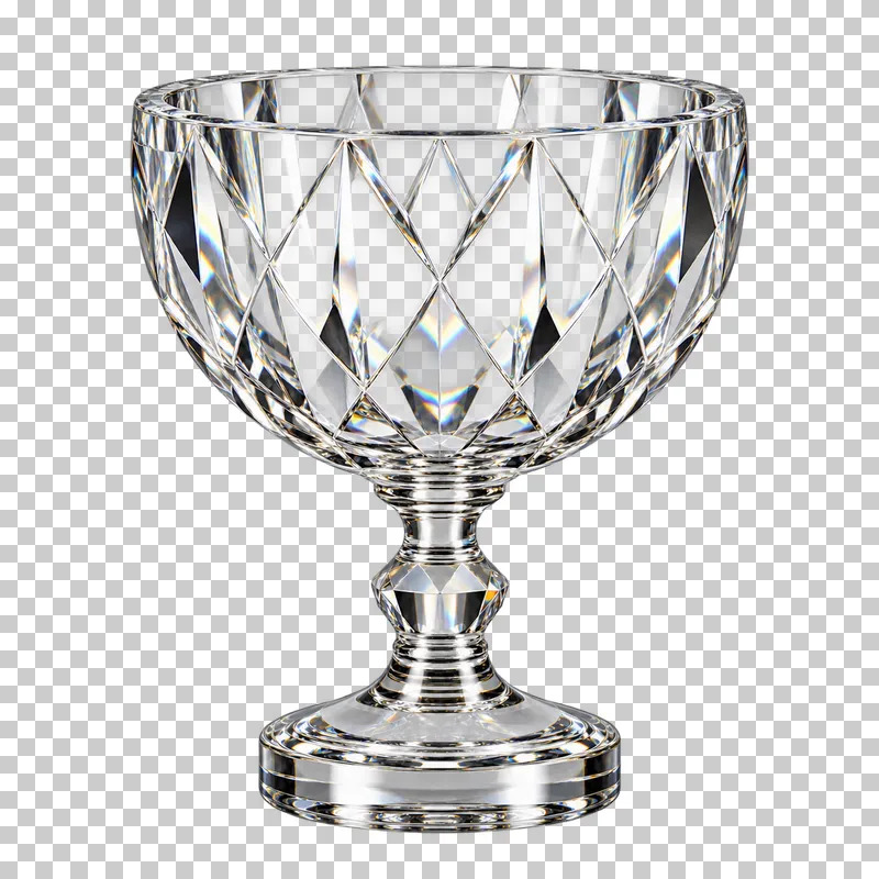 A clear faceted glass trophy cup with a connected glass stem and foot.