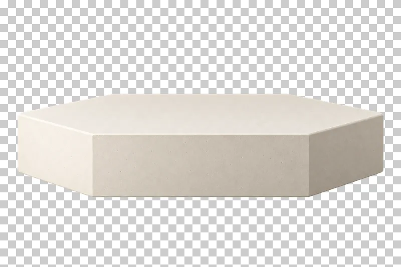 A low cream plaster hexagonal podium with a broad empty six-sided top.