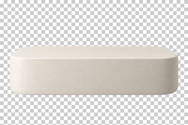 A low cream plaster square block with rounded corners and a flat empty top.