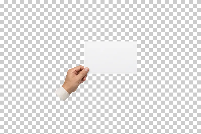An adult hand holding a blank white landscape sheet by its lower-left corner.