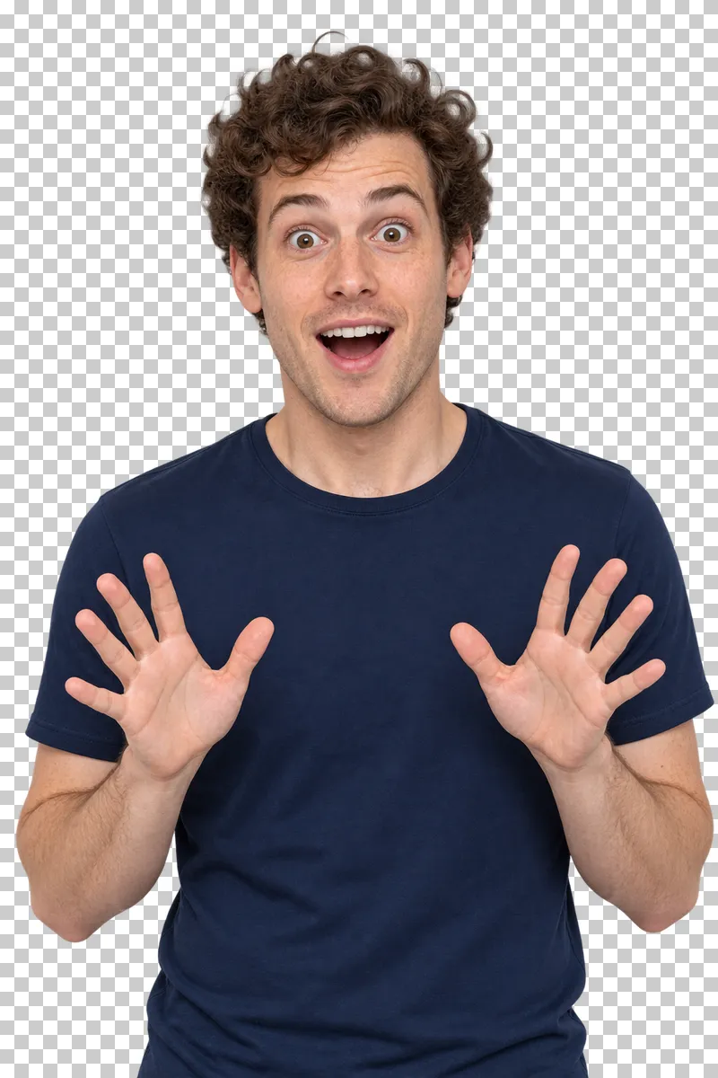 A curly-haired freckled man in a navy T-shirt with an open-mouthed surprised expression.