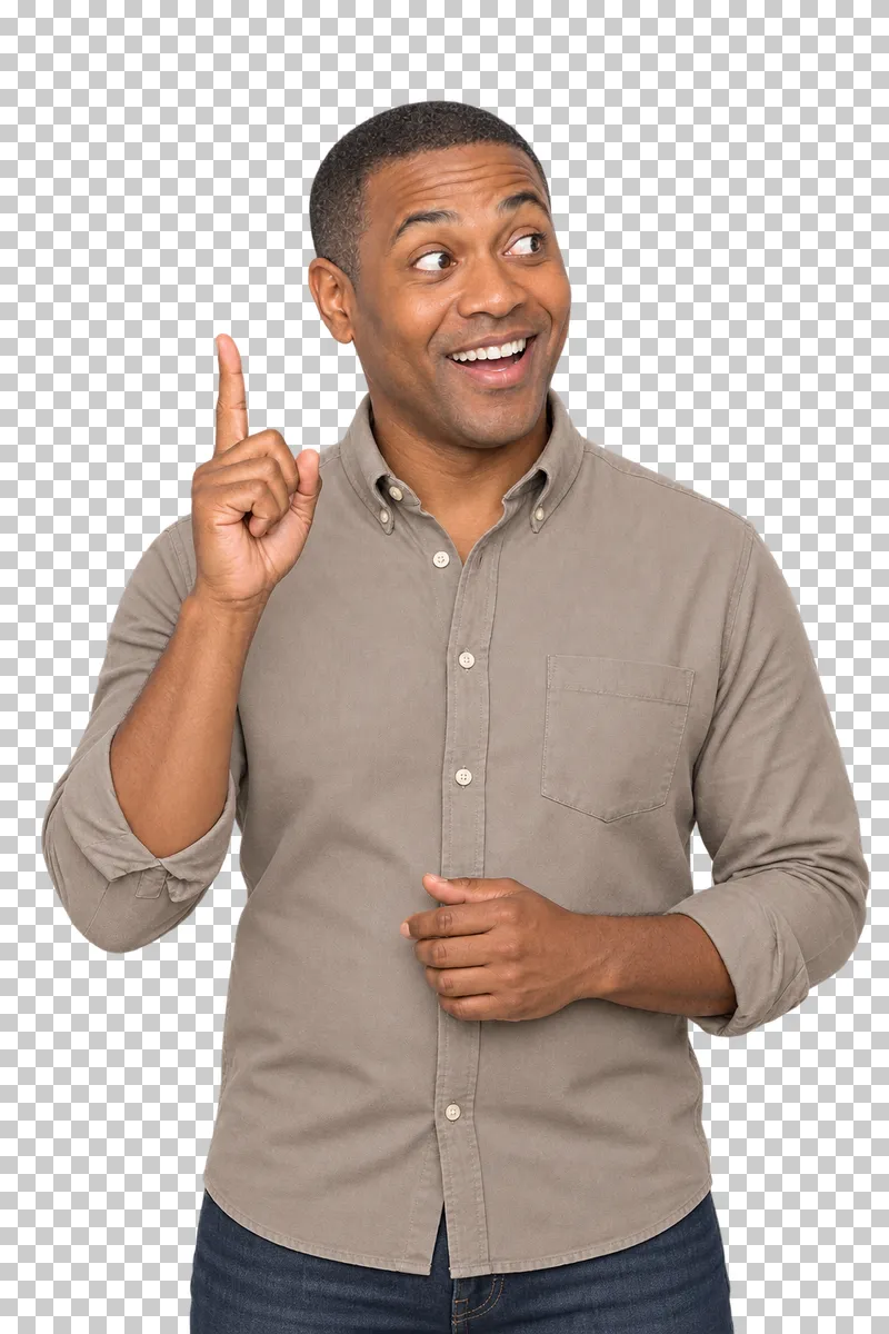 A man in a taupe shirt raising one index finger with a happy expression of understanding.