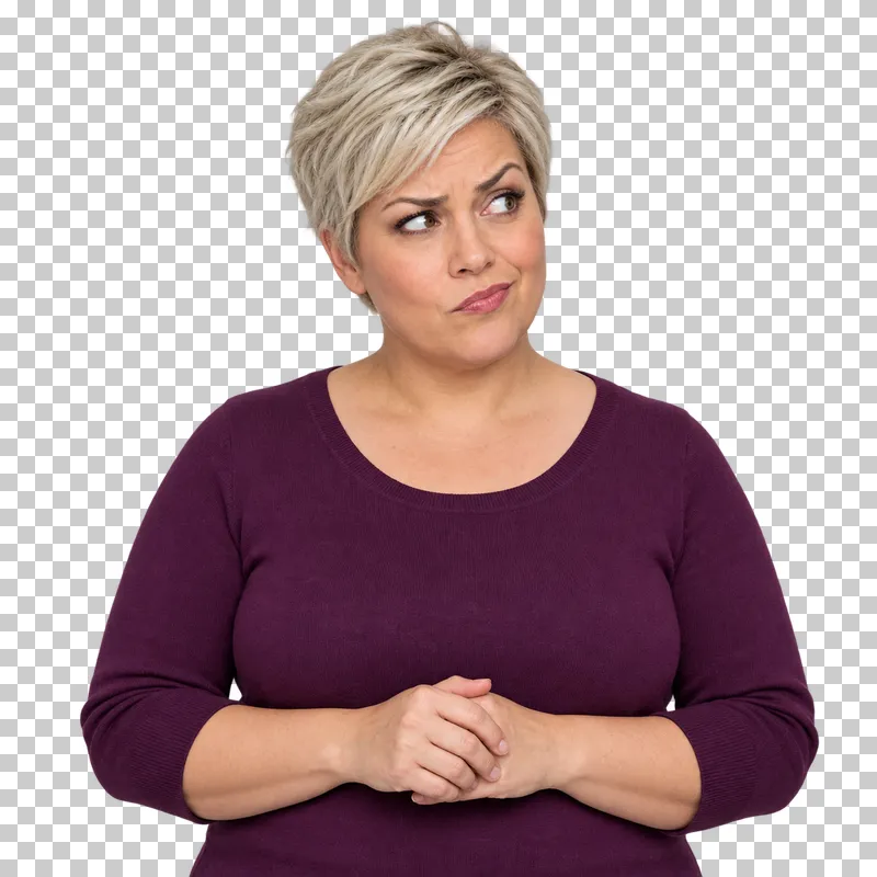 A short-haired platinum-blonde woman in a plum top giving a skeptical sideways glance.