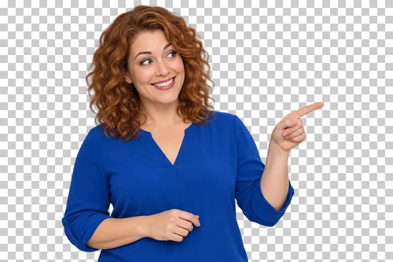 A copper-haired woman in a cobalt blue blouse smiling with satisfaction and pointing to the right.