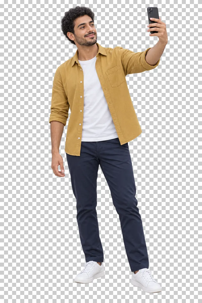 A traveler taking a selfie with a phone held in an extended hand.
