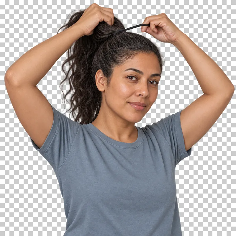 A person gathers hair into a ponytail with both hands.