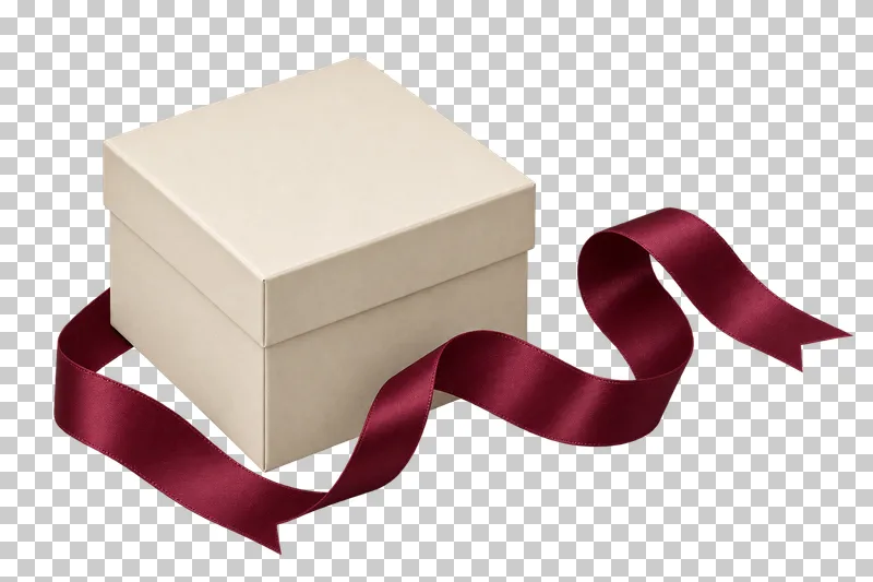 One cream closed gift with a burgundy satin ribbon unfurled beside it, all ribbon ends complete.