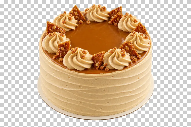 Whole caramel cake with an amber caramel top, caramel cream piping and small toffee pieces.