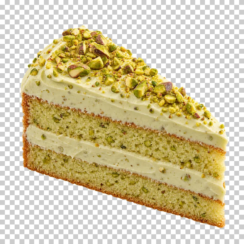 Pistachio cake slice with two nut filled sponge layers, pistachio cream and chopped pistachios on top.