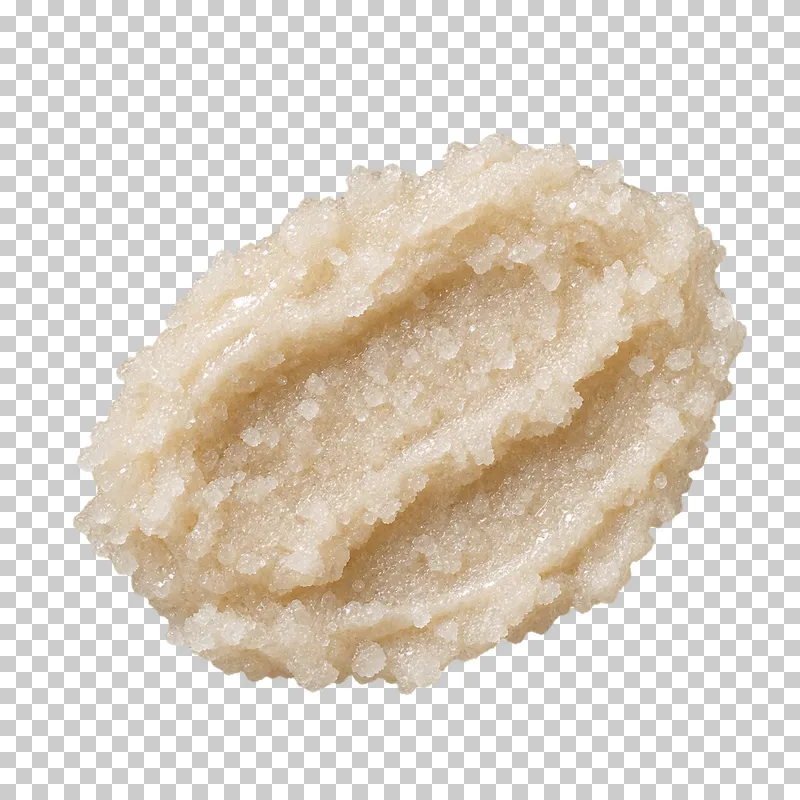 Coarse irregular sugar grains in a moist coherent binder.